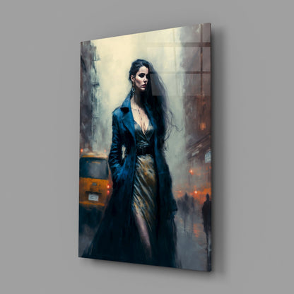 Glass wall art panel displaying a woman in dark blue coat standing on an urban street with yellow taxi and misty cityscape background.