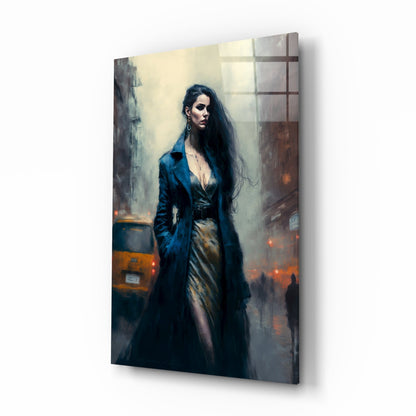 Glass wall art panel displaying a woman in dark coat standing in urban street scene with yellow taxi and muted architectural background.