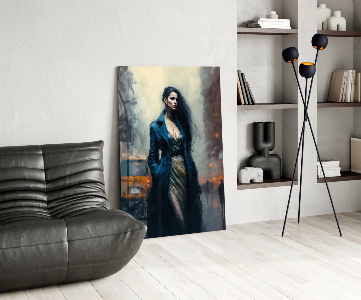 Modern living room interior featuring a vertical glass wall art panel depicting a woman in a blue coat against an urban backdrop.