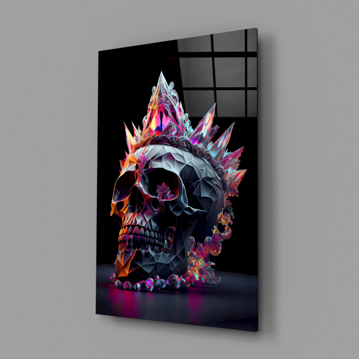 Diamond Skull Glass Wall Art displayed at an angle showing vibrant neon pink, orange, and blue crystalline skull with geometric spikes against black background.
