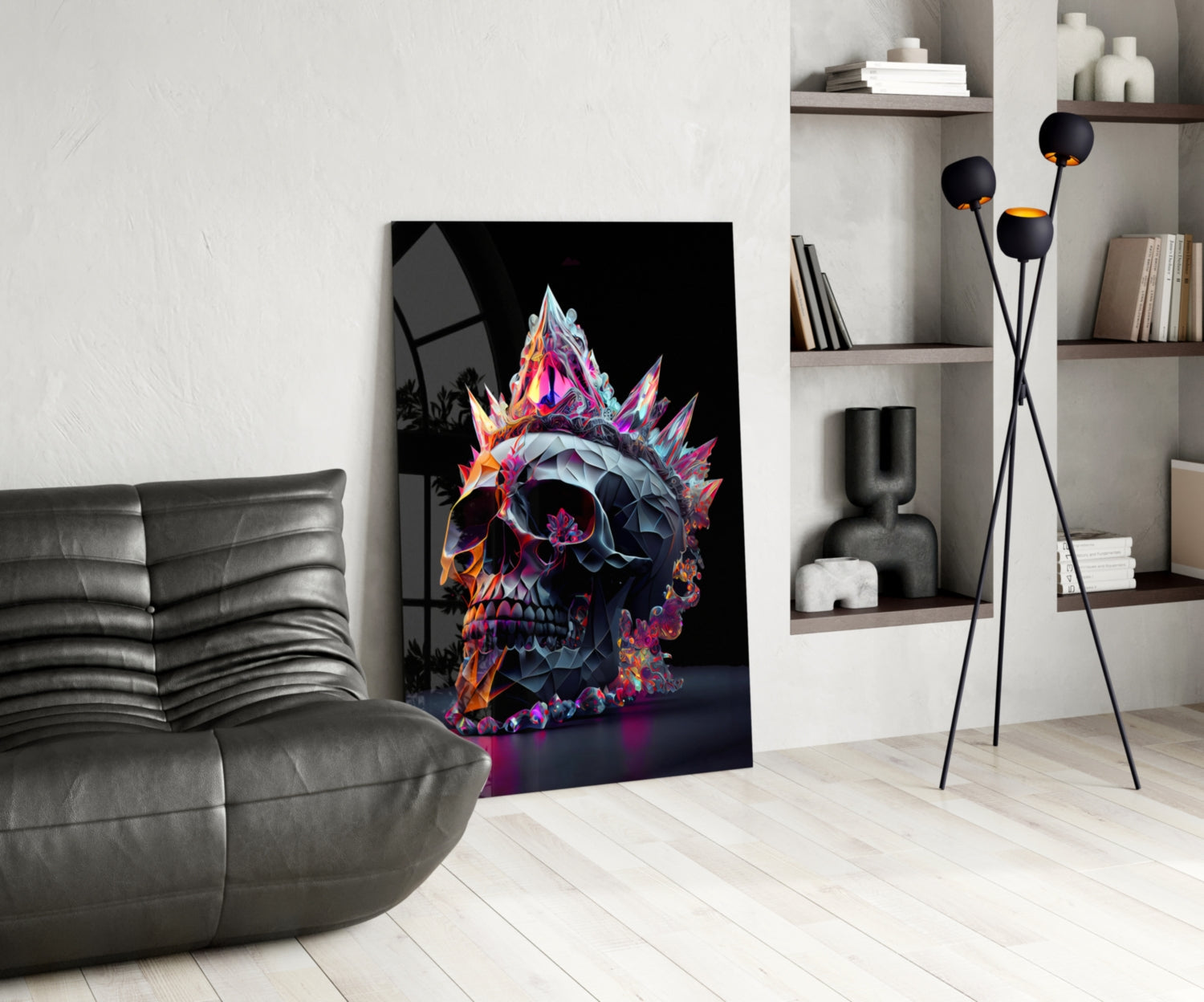 Vibrant neon-colored crystal skull artwork displayed in modern living room with gray leather sofa and shelving.