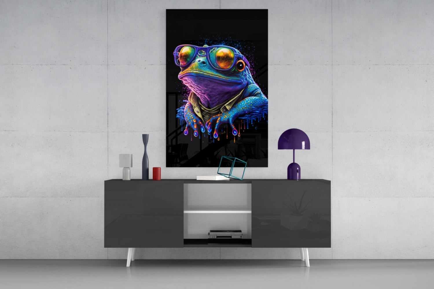 Neon-colored frog wearing sunglasses and bandana displayed on wall above modern gray media console with purple lamp.