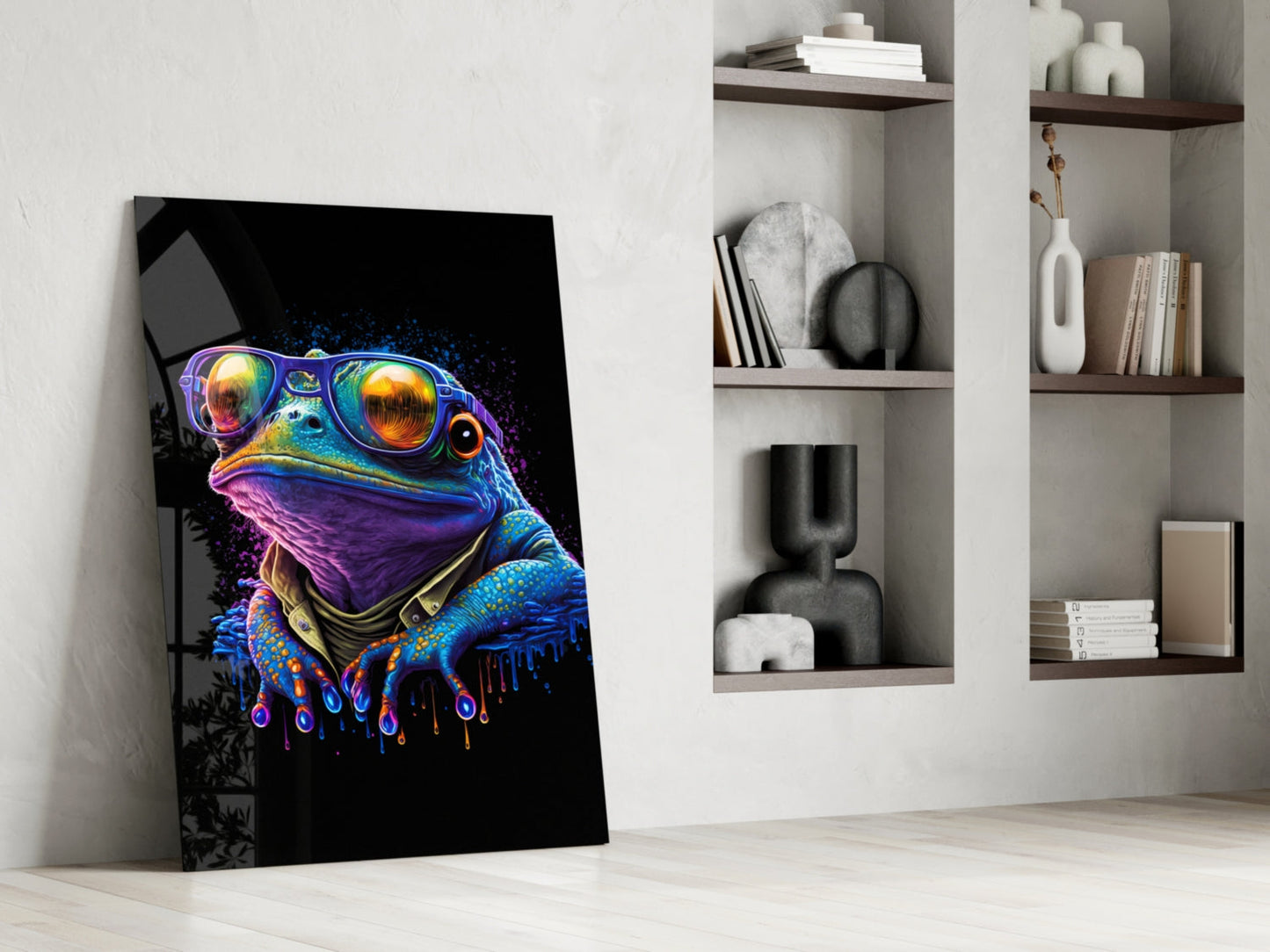 Vibrant neon frog artwork leaning against white wall beside shelving unit displaying decorative objects.