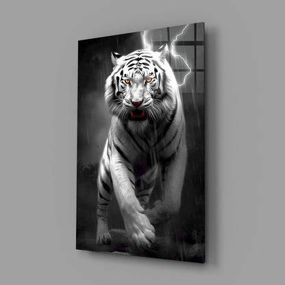White tiger with amber eyes and lightning bolts on black glass wall art, angled product view.