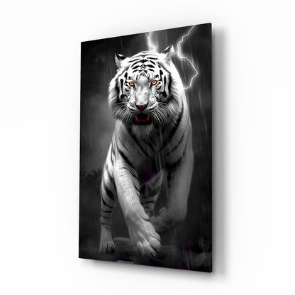 White tiger with glowing amber eyes walking forward through rain and lightning on black glass wall art panel.