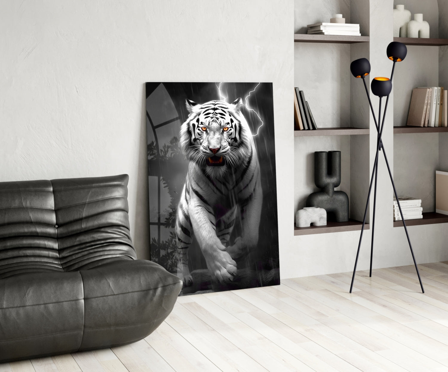Black and white tiger with glowing eyes and lightning backdrop displayed as glass art in modern living room with leather chair and shelving.