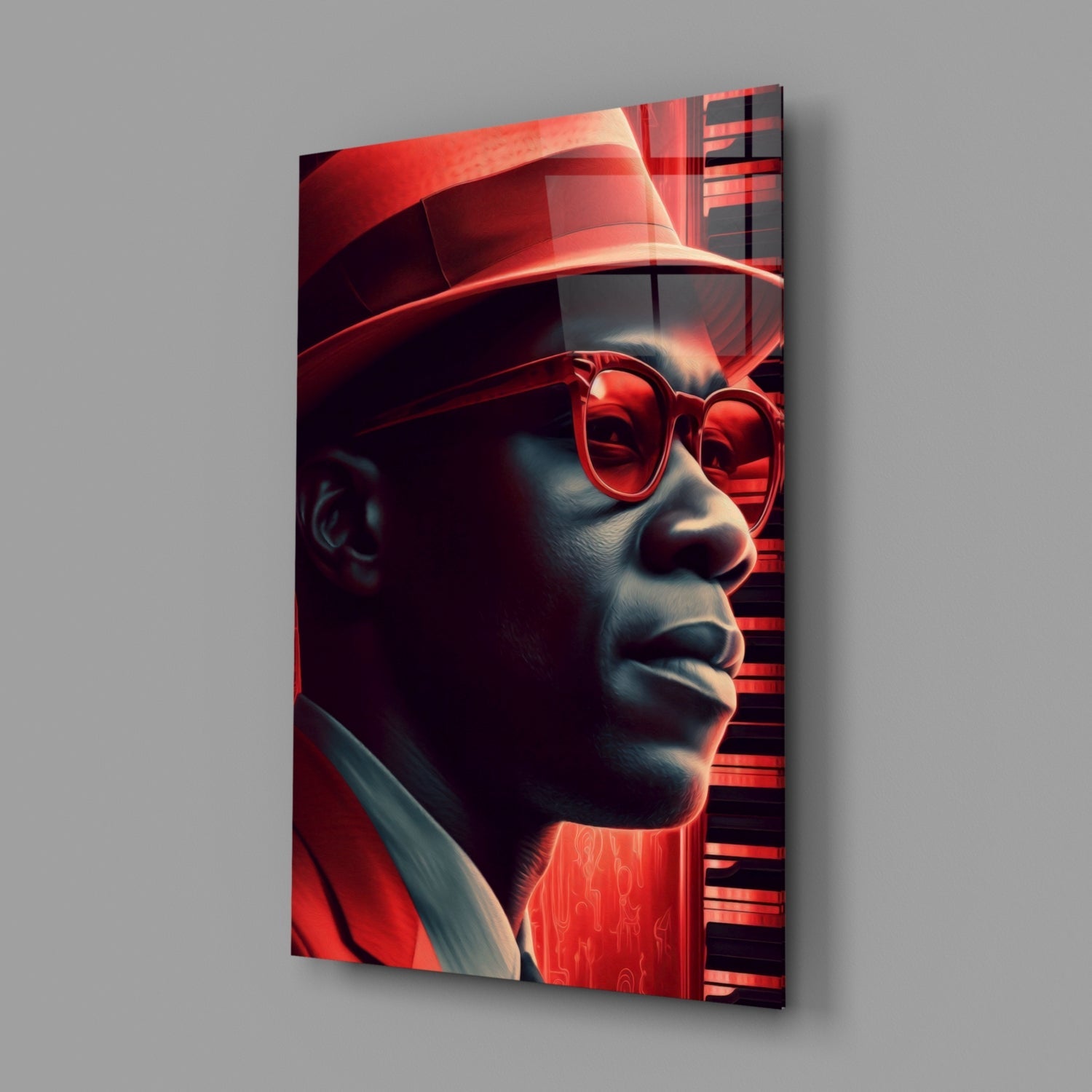 Profile view of glass wall art featuring a figure wearing red-tinted sunglasses and fedora hat against neon red and black geometric background.