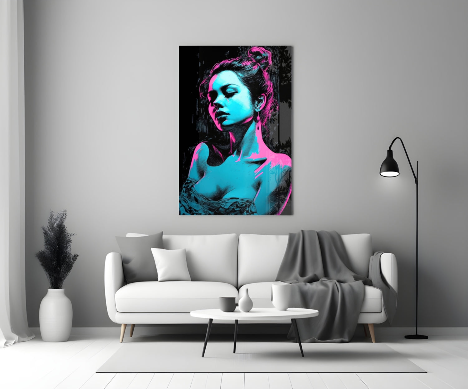Neon cyan and magenta portrait glass wall art hanging above white sofa in minimalist living room setting.