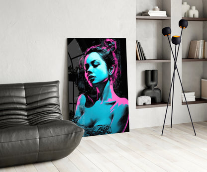 Modern living room interior featuring neon cyan and magenta pop art portrait of a woman on glass panel leaning against white wall.