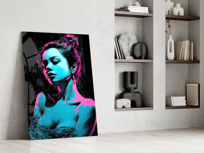 Vibrant pop art glass wall panel featuring neon cyan and magenta portrait leaning against white wall beside shelving.