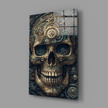 Steampunk-style skull wall art with ornate brass detailing, mechanical gears in eye sockets, displayed at an angled perspective against gray background.