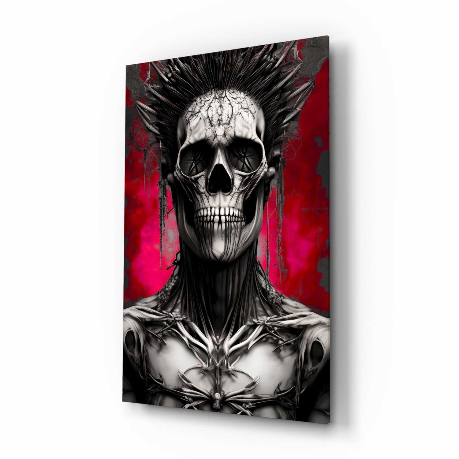 Angled view of glass wall art featuring a skeletal skull with spiky hair against a vibrant red and black background.