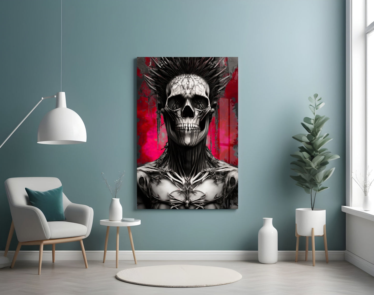 Warrior Glass Wall Art hanging on a teal wall above a white chair, displaying a black and white skull with spiky hair against a red background.