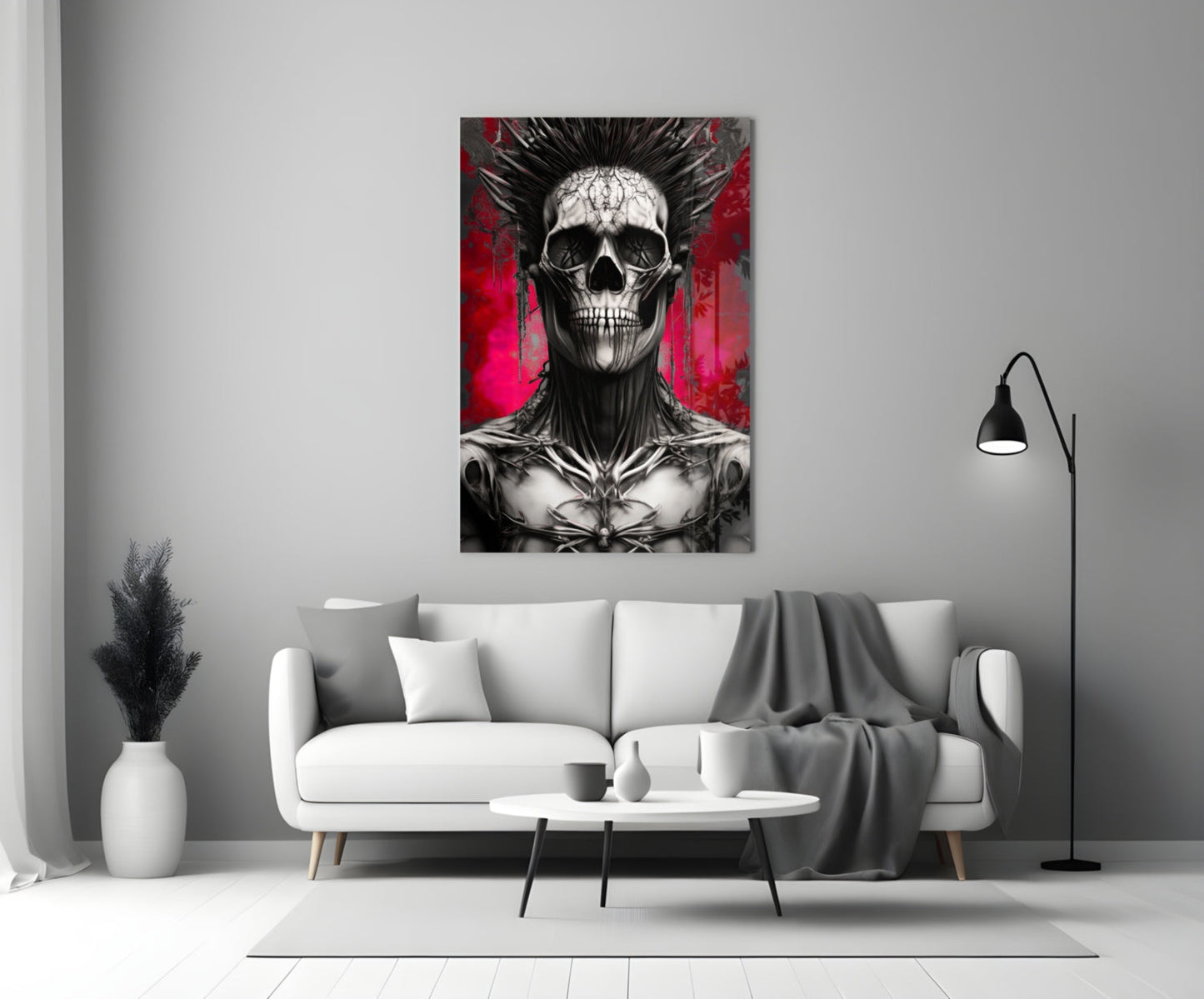 Skull artwork with black spiky hair and red background displayed above white sofa in modern living room.