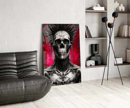 Modern living room featuring a glass wall art panel displaying a monochrome skull with spiky hair against a vibrant red background.