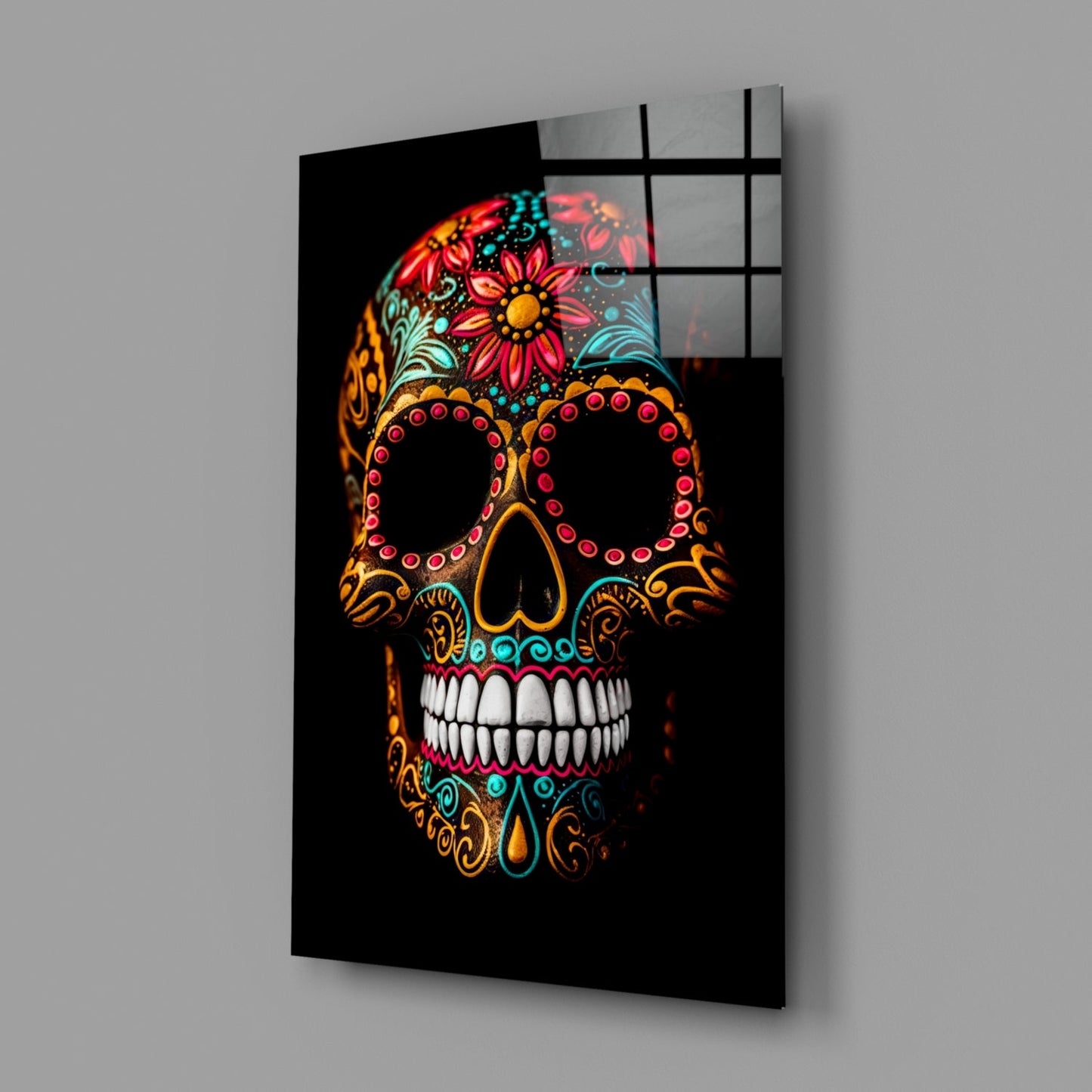 Angled view of a black glass wall panel featuring a colorful skull with red flowers, gold filigree, and white teeth against dark background.