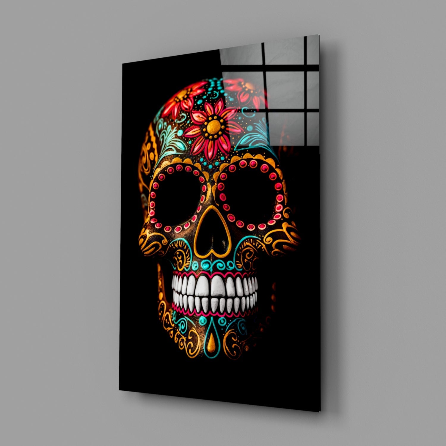 Angled view of a black glass wall panel featuring a colorful skull with red flowers, gold filigree, and white teeth against dark background.