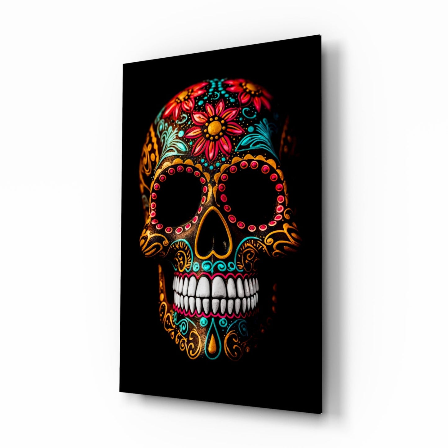 Colorful skull with red flowers, gold swirls, turquoise accents, and white teeth on black glass panel, angled three-quarter view.