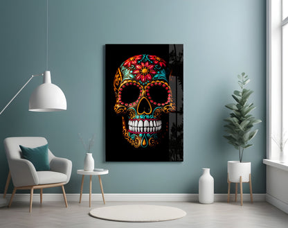 Colorful skull glass wall art with red flowers and ornate patterns displayed in a modern room setting with teal walls and white furniture.