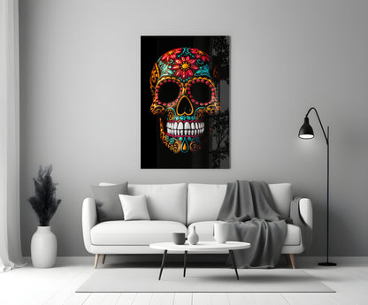 Colorful skull glass wall art with floral and ornamental patterns displayed above white sofa in modern living room.