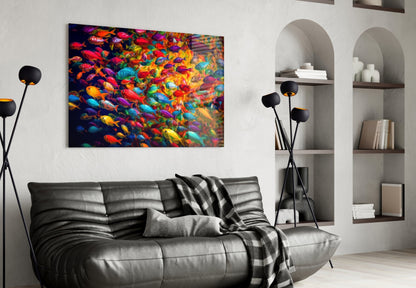 Vibrant colorful fish glass wall art hanging above black leather sofa in modern living room interior.