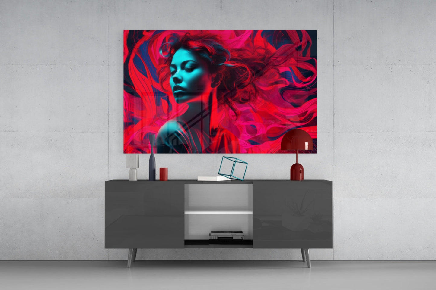 Modern living room with neon red and cyan abstract portrait artwork displayed above dark grey media console with decorative accessories.