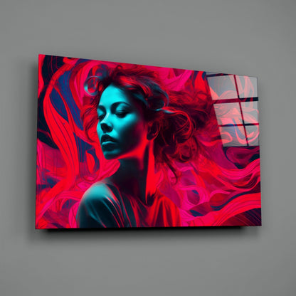 Modern glass wall art featuring a woman's profile with cyan and red neon lighting against an abstract swirling background, displayed at an angle on gray wall.