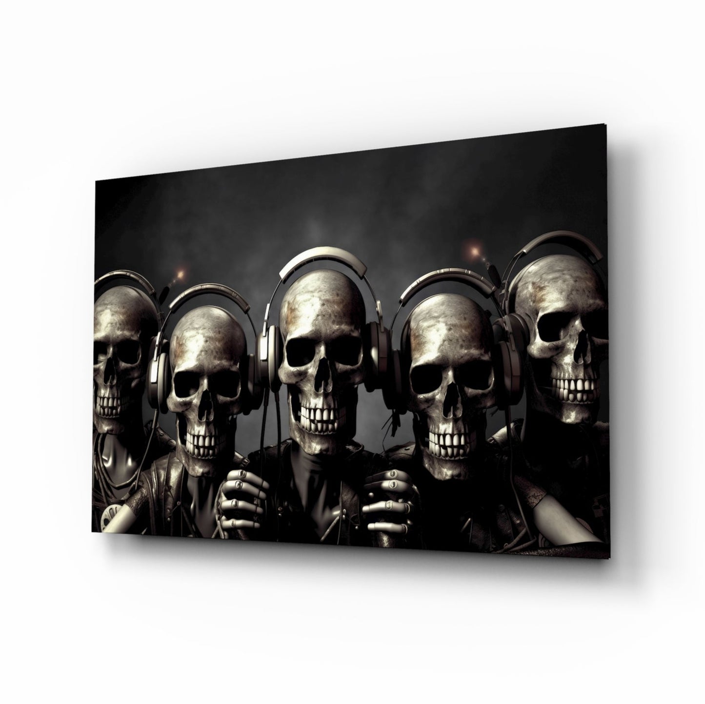 Five metallic skulls wearing headphones arranged in a row against a dark background, displayed as a glass wall art panel.
