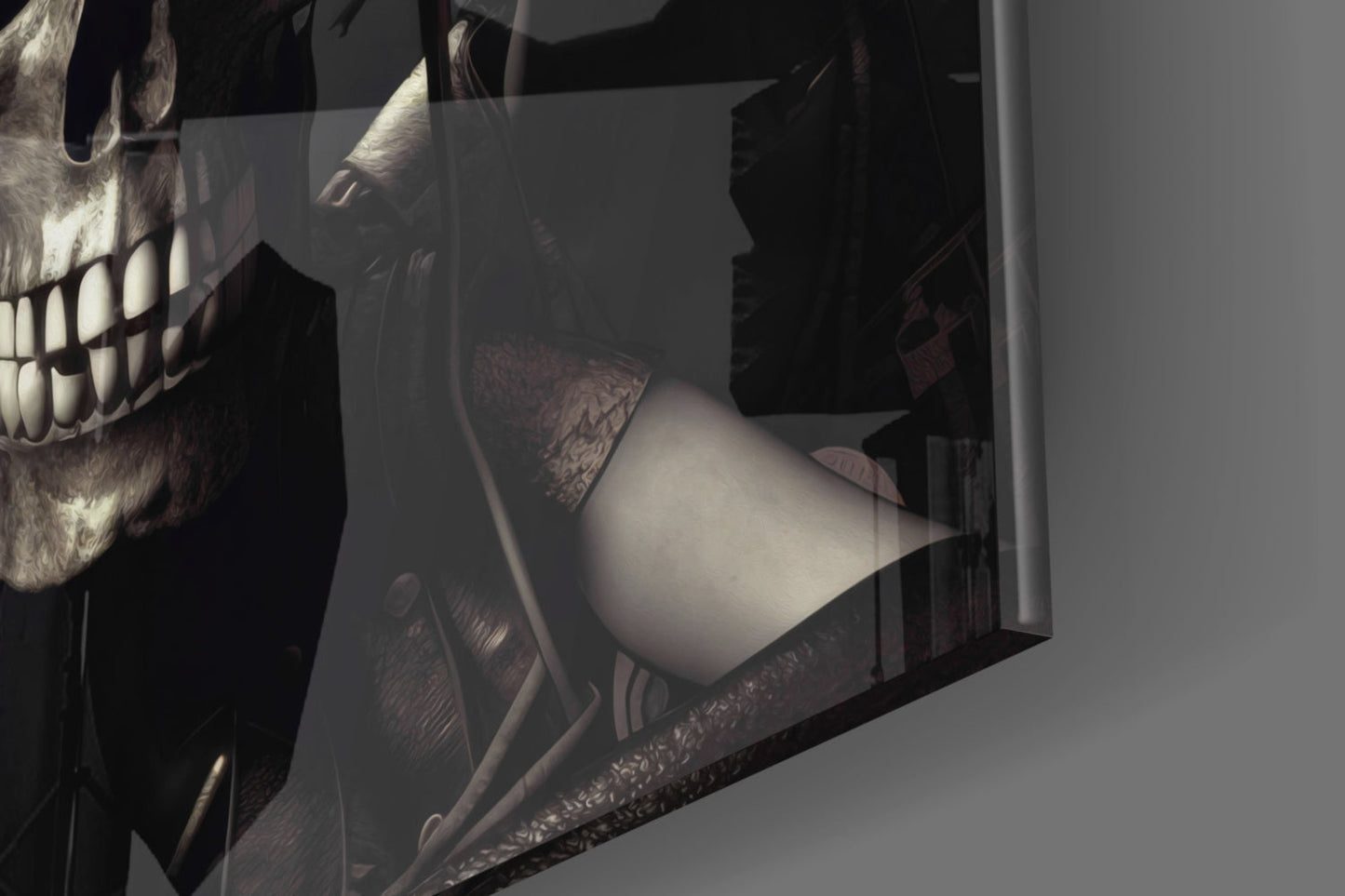 Close-up angled view of skull glass wall art showing detailed skull profile with bared teeth and decorative patterns on dark background.