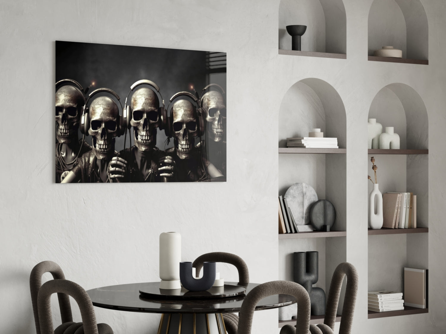 Skull Party glass wall art mounted above black dining table in modern interior with white shelving unit and gray chairs.