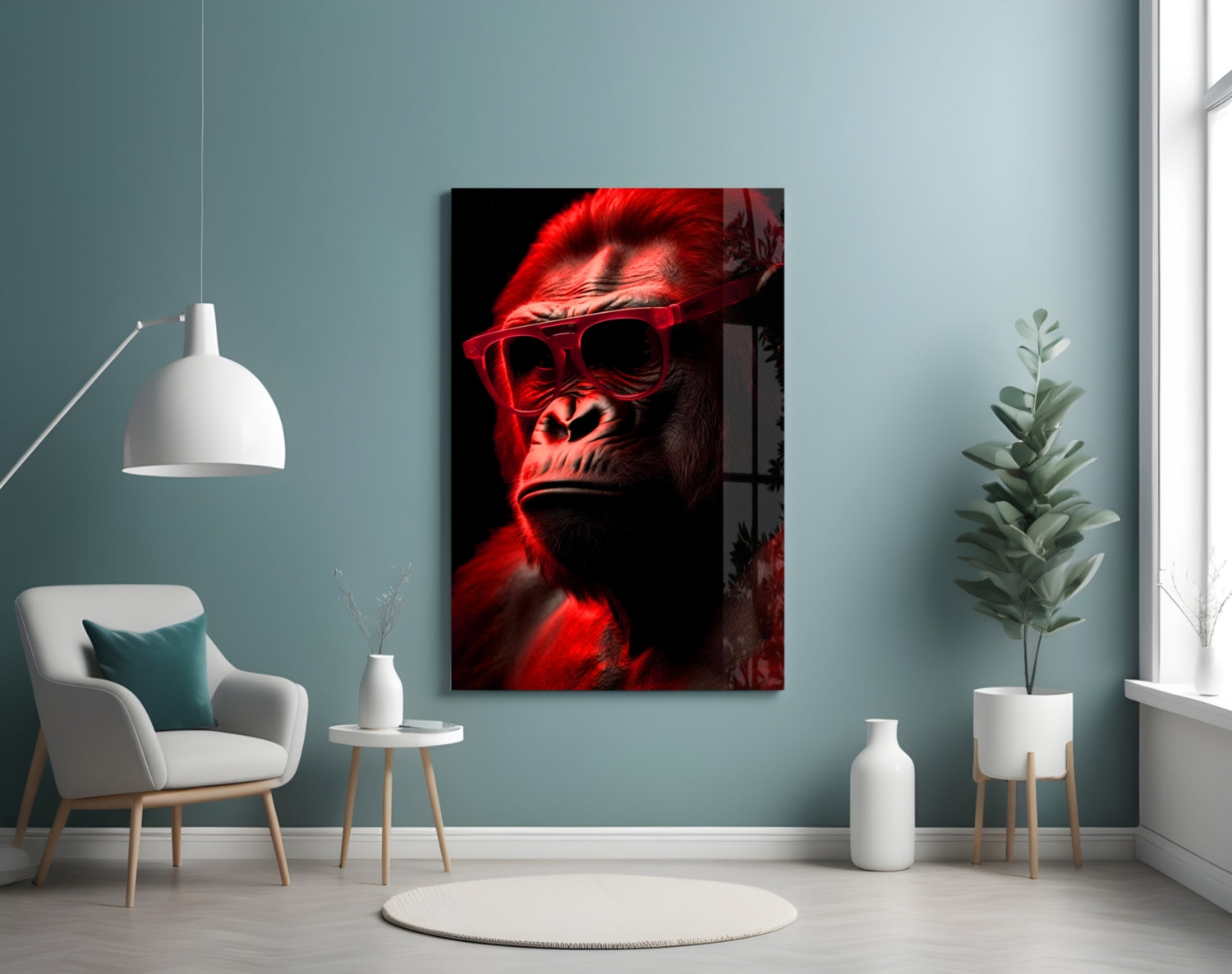 Red neon-glowing ape wearing sunglasses displayed on wall above white chair in modern interior setting.