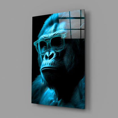Cool-toned gorilla wearing oversized sunglasses displayed on blue-gridded glass wall art panel.