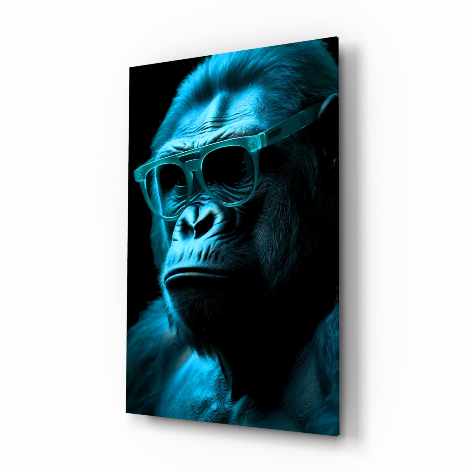 Cool-toned blue-lit gorilla wearing oversized glasses against black background on angled glass panel.