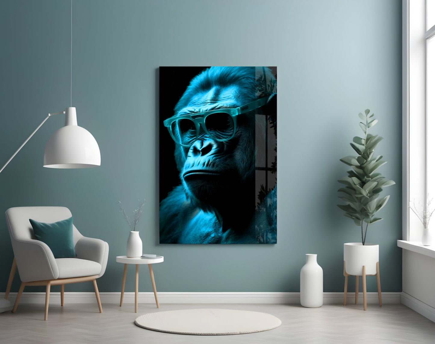 Blue neon-lit gorilla wearing sunglasses displayed on wall above white chair in minimalist interior setting.