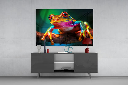 Vibrant rainbow frog glass wall art displayed above gray media console in modern living room setting.