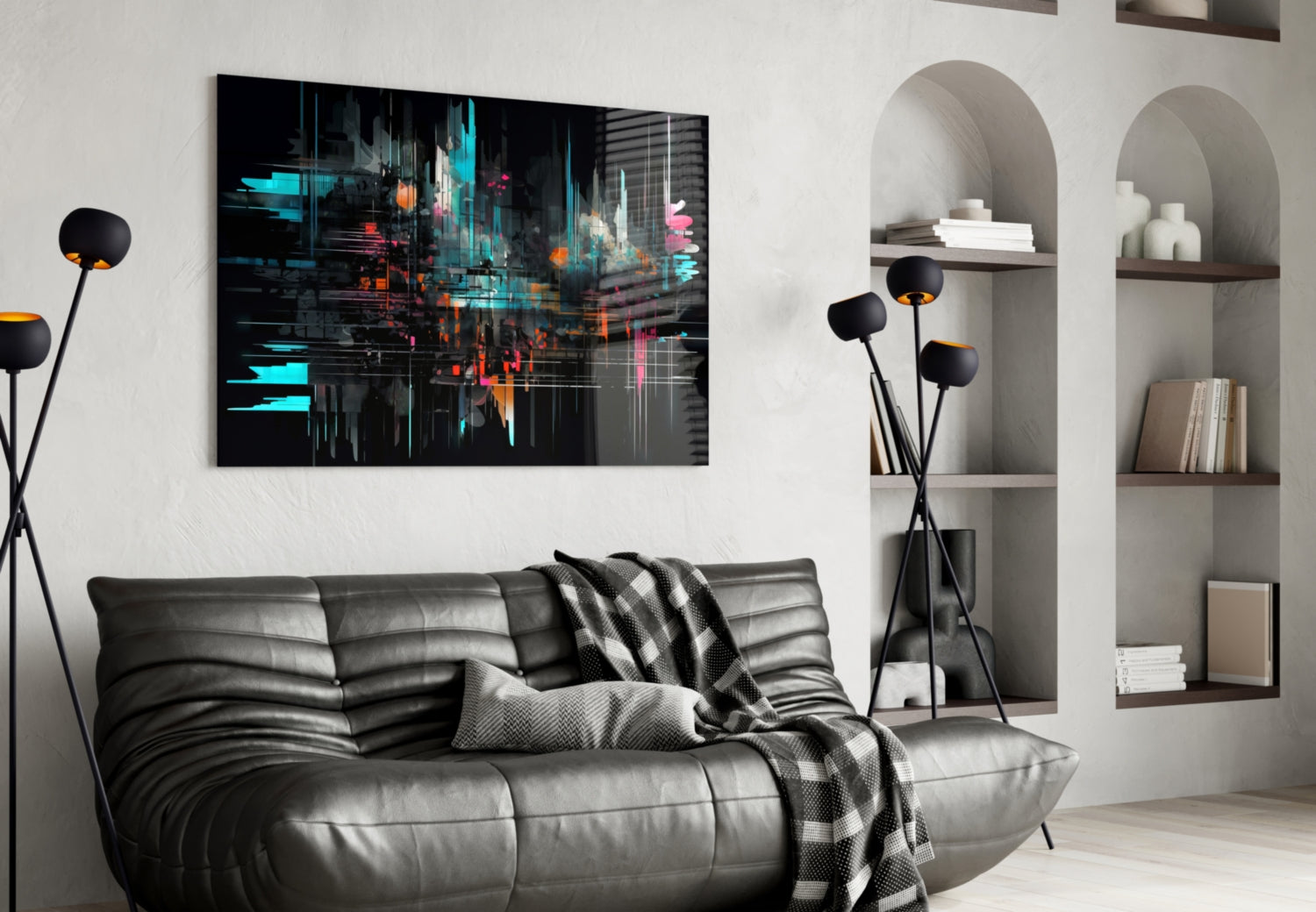 Modern living room with black leather sofa displaying colorful neon abstract glass wall art above, flanked by black floor lamp and white arched shelving.