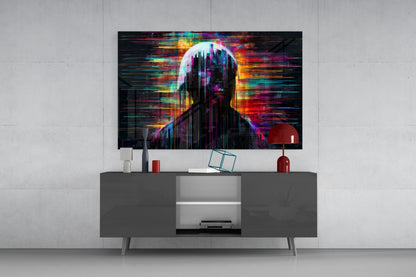 Colorful digital art glass panel displaying a glitching humanoid figure mounted above gray media console in modern living room setting.
