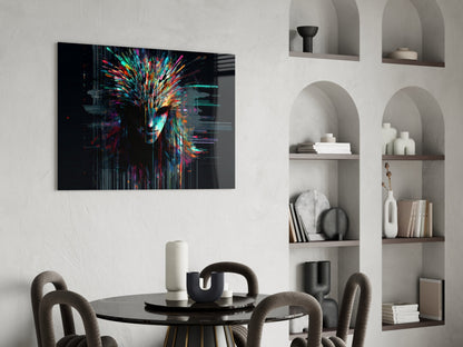 Colorful digital face artwork with neon streaks displayed above a black round dining table in a modern white interior with built-in shelving.