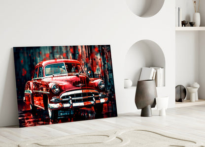 Red vintage car glass art leaning against white wall in minimalist interior with decorative objects.
