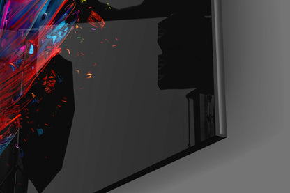 Vibrant red and blue feather glass wall art installed on dark interior wall beside doorway, displaying dynamic color gradient.