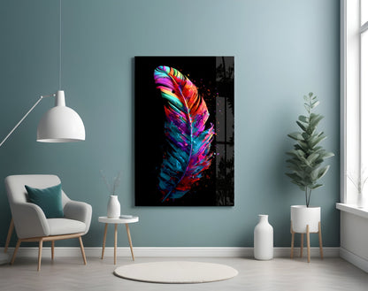 Colorful neon feather glass wall art displayed in modern turquoise room with white chair and plants.