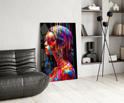Colorful neon portrait glass art leaning against wall in modern living room with gray sofa and shelving.