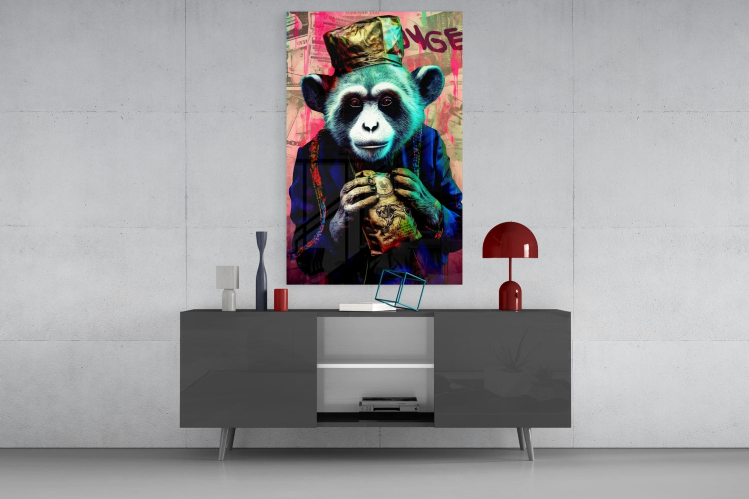 Colorful pop art glass wall art of a chimp wearing a crown and holding a heart, displayed above a modern gray sideboard in a minimalist interior.