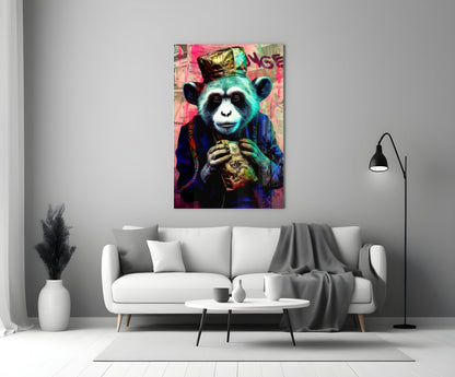 Colorful glass wall art depicting a stylized turquoise monkey wearing a crown and blue jacket, holding a golden object, displayed above a white sofa in a modern living room.