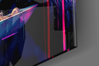 Large glass wall art panel displaying vibrant neon pink and blue abstract design with illuminated edges against gray wall.