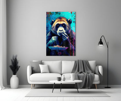 Colorful glass wall art of a chimpanzee with cyan and magenta tones displayed above a white sofa in a minimalist living room.