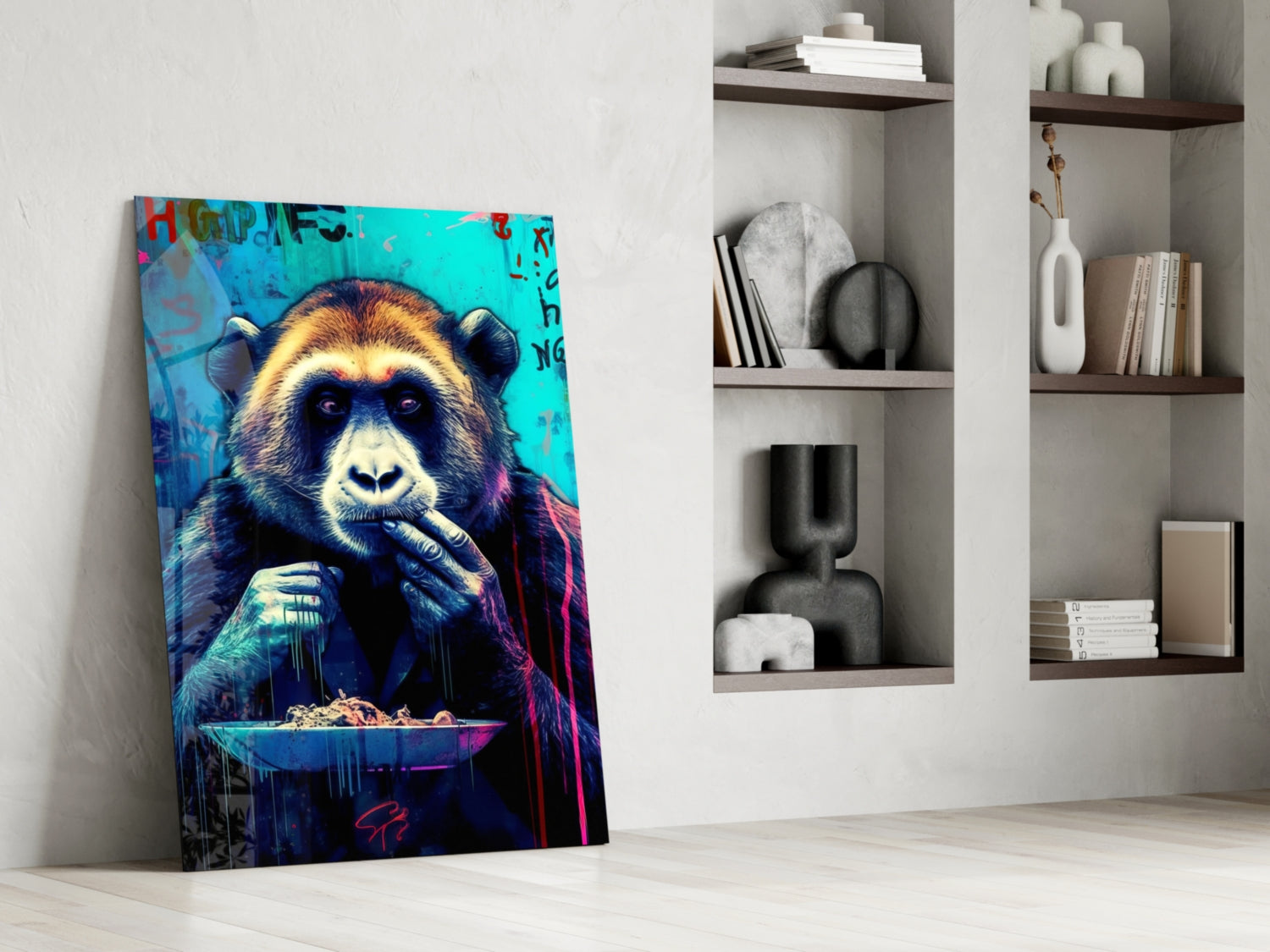 Colorful glass wall art depicting a vibrant blue chimp with yellow face holding a bowl, leaning against white wall beside shelving.