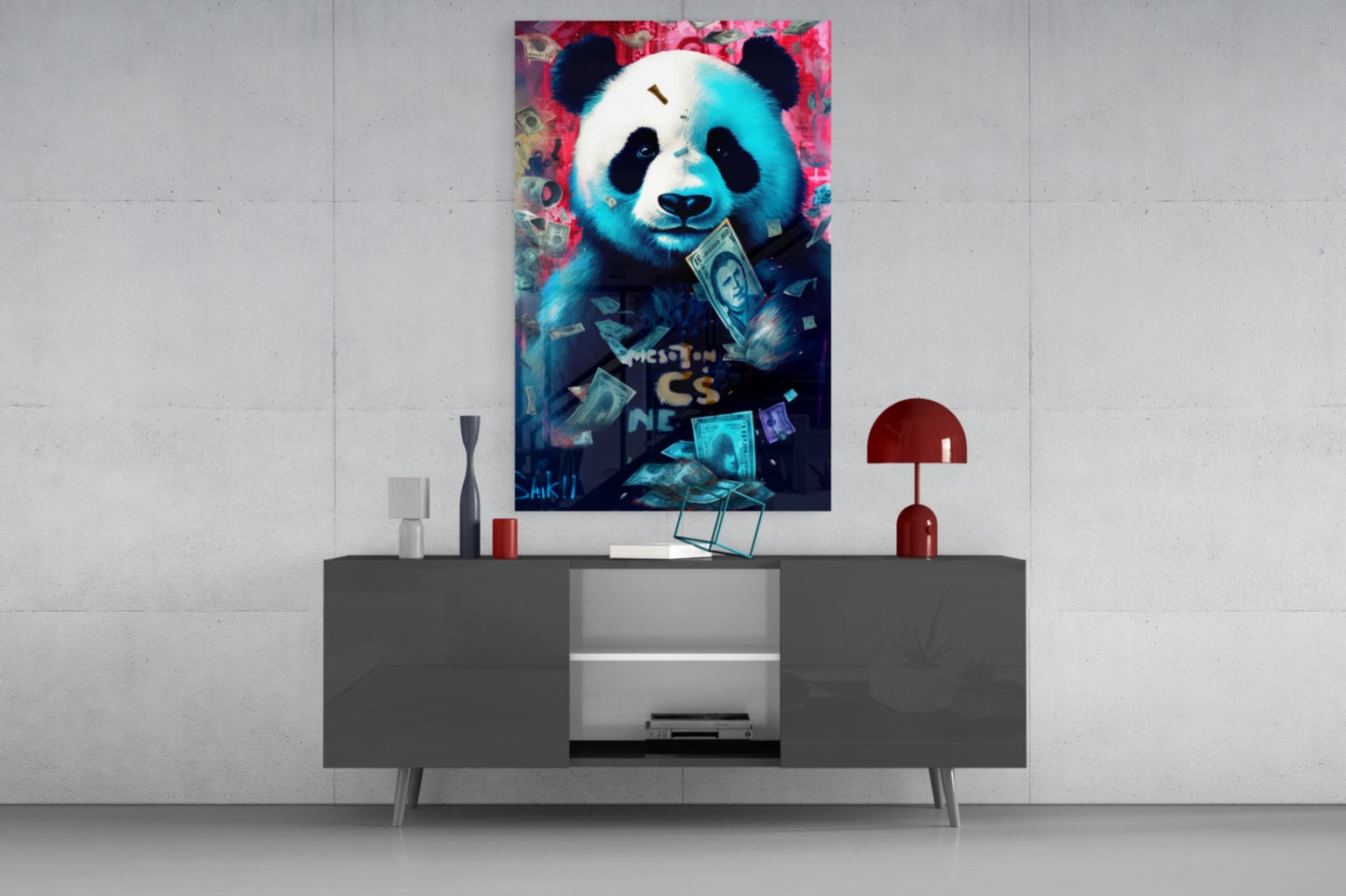 Colorful panda glass wall art with neon pink and turquoise tones displaying money and text, mounted above gray media console in modern room setting.