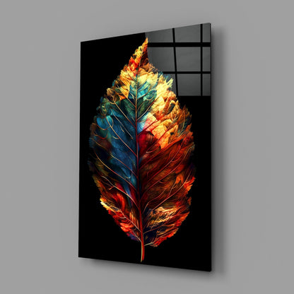 Angled perspective of a glass wall panel featuring a luminous feather with gradient colors transitioning from blue-green to red-orange against a black background.
