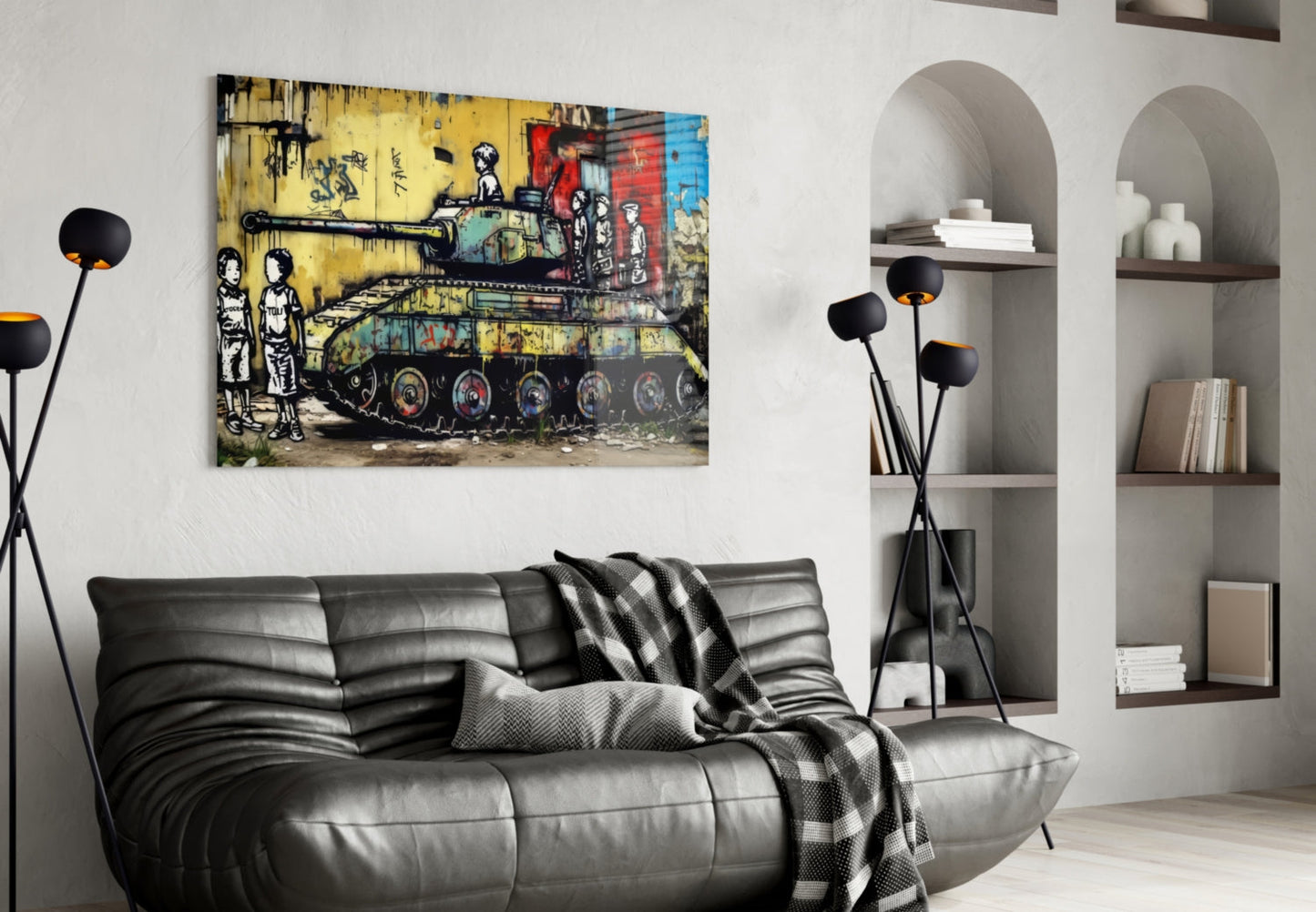 Street art glass print depicting colorful graffiti tank with figures, displayed above black leather sofa in modern living room interior.